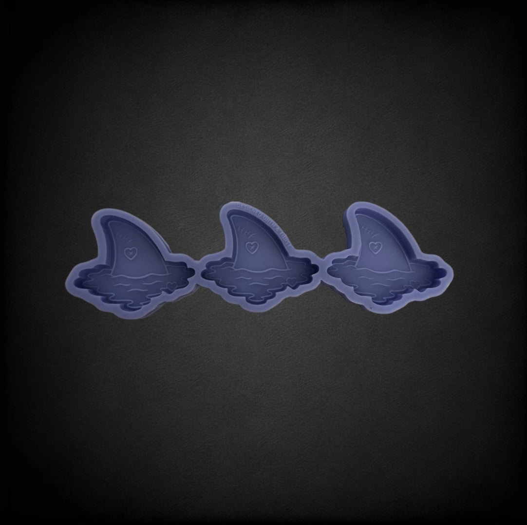 Shark fin trio